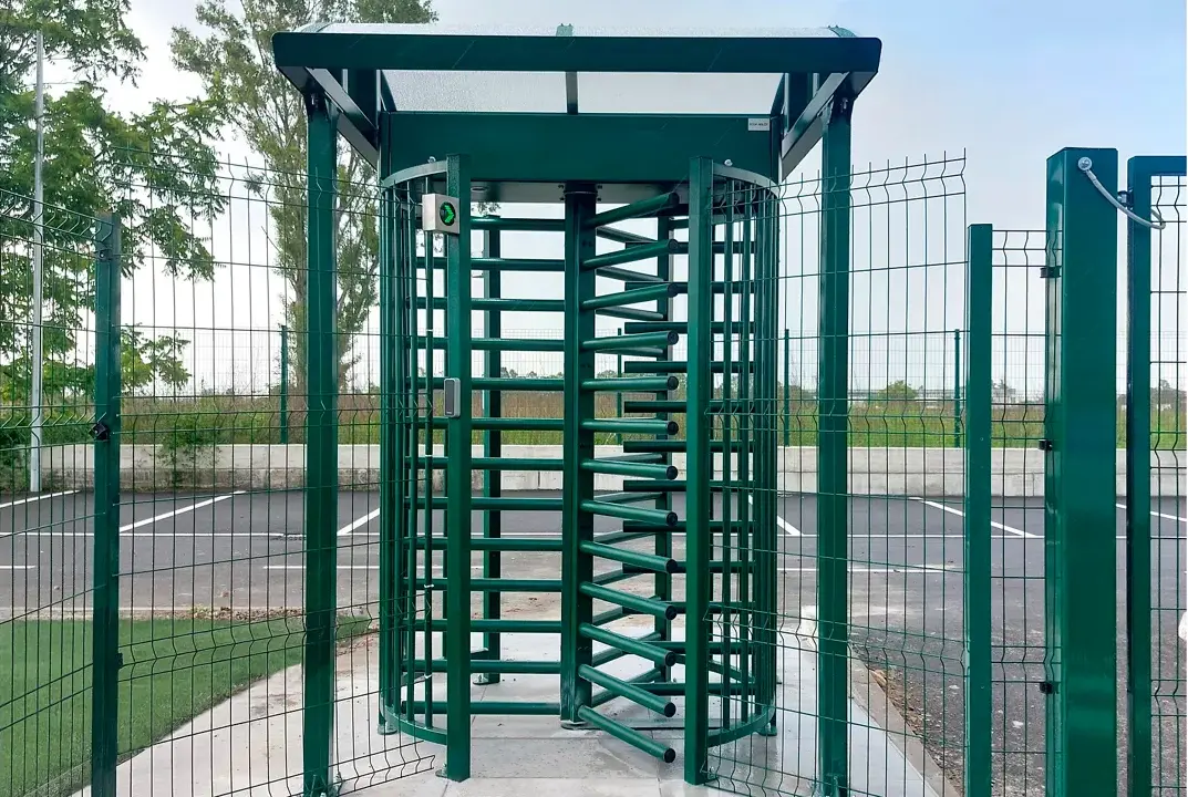 Full height turnstile installed at corporate office lobby for secure pedestrian access