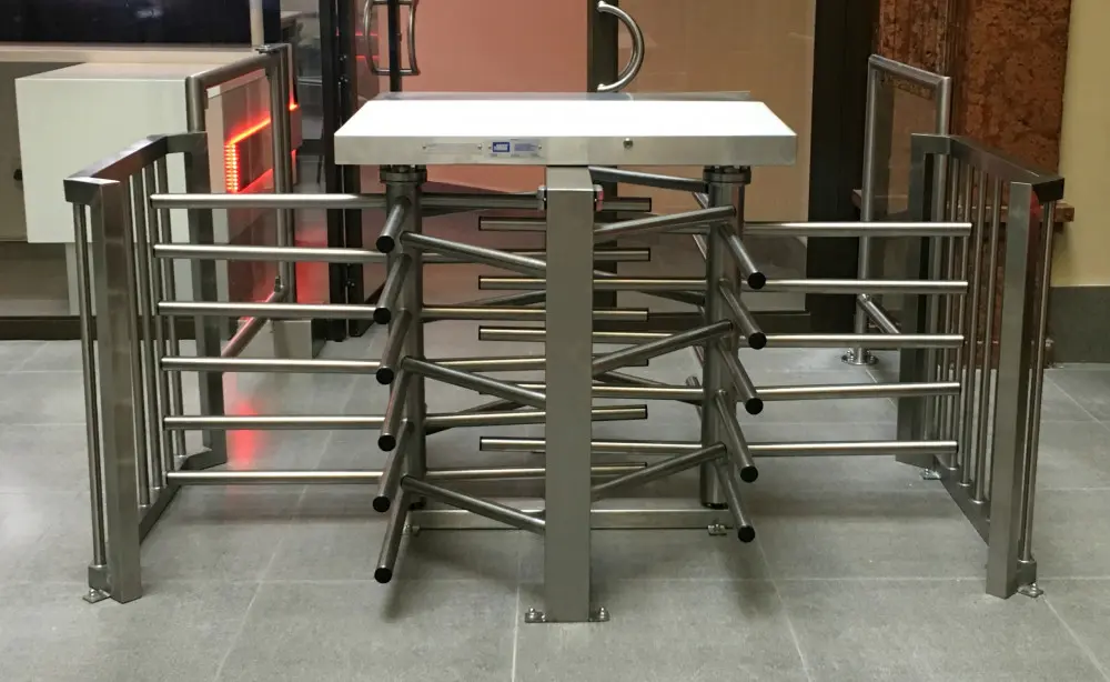 Half height turnstile installed at residential tower entrance for controlled access